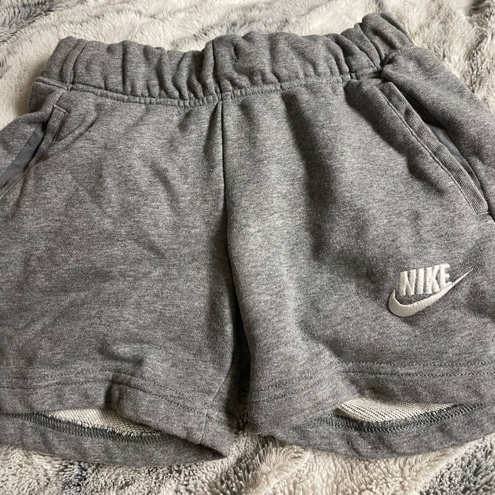 Grey nike shorts comfortable size medium don't fit me no more only wore 3 times